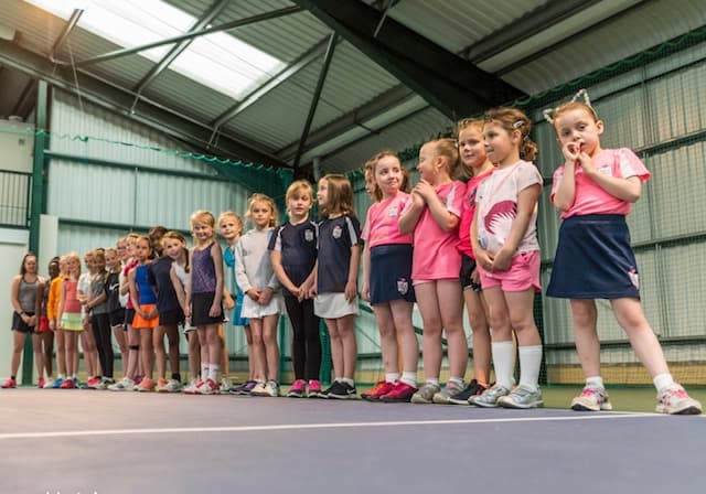 Young athletes training together in a gymnasium